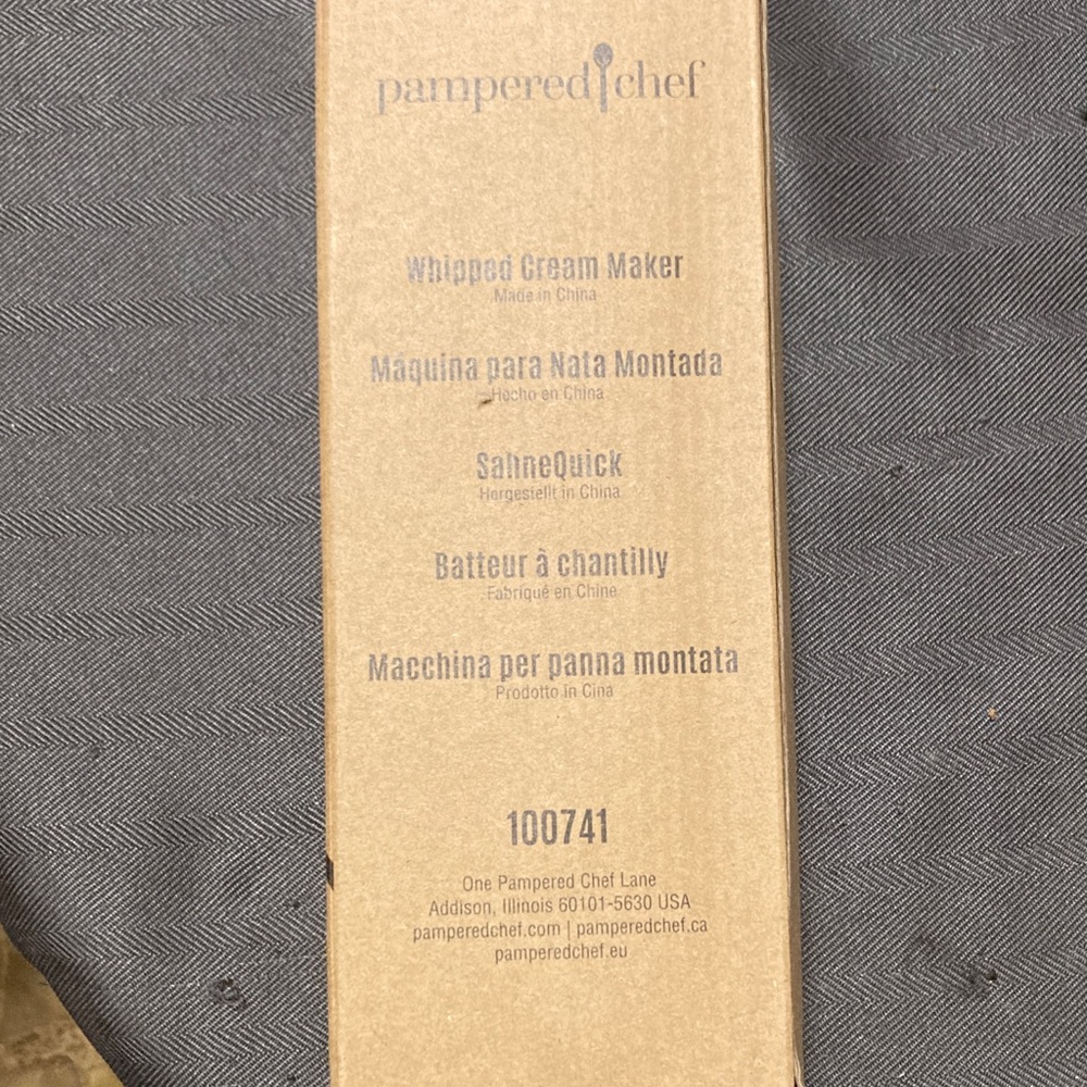 Pampered Chef Whipped Cream Maker new in box( box has some damage). See pic